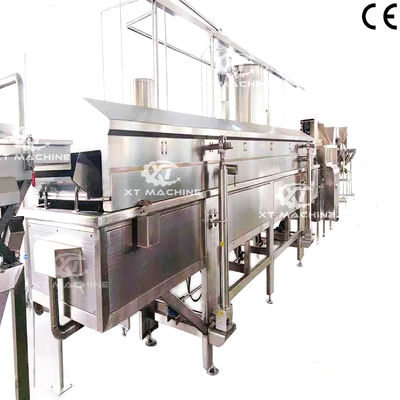 Máquina de freír continua automática avanzada de las fábricas de procesamiento de nueces para la línea de producción de cacahuetes de anacardos